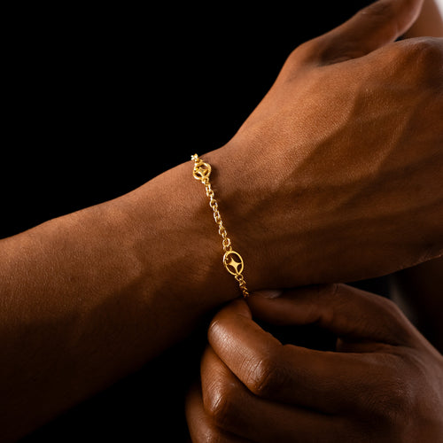 Bracelet câble Signature doré